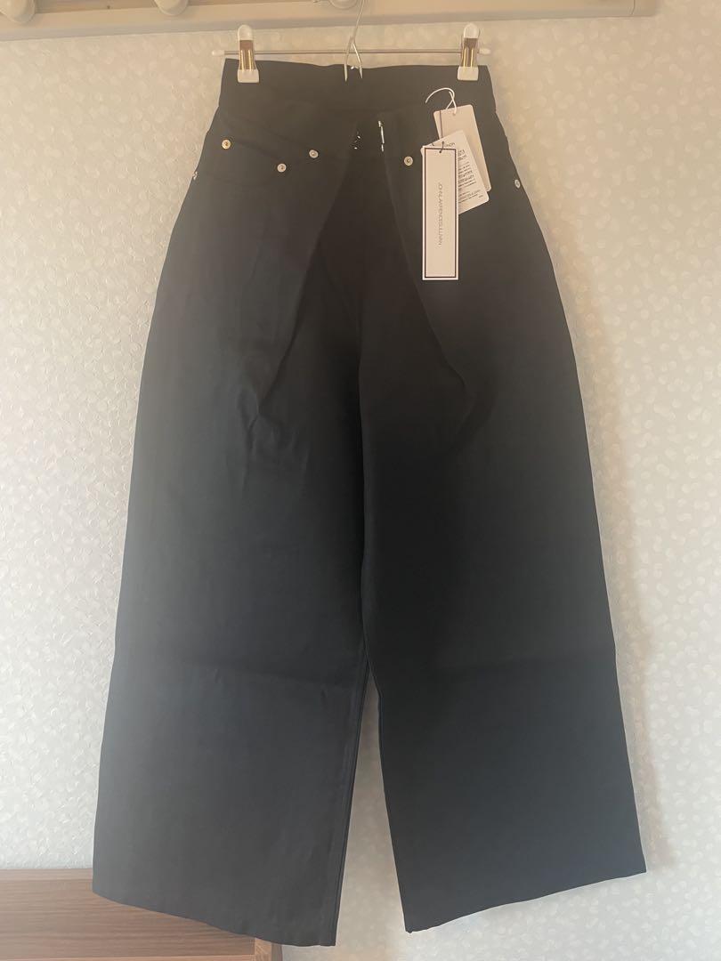 Brand new, unused JOHN LAWRENCE SULLIVAN black wide-leg pants.