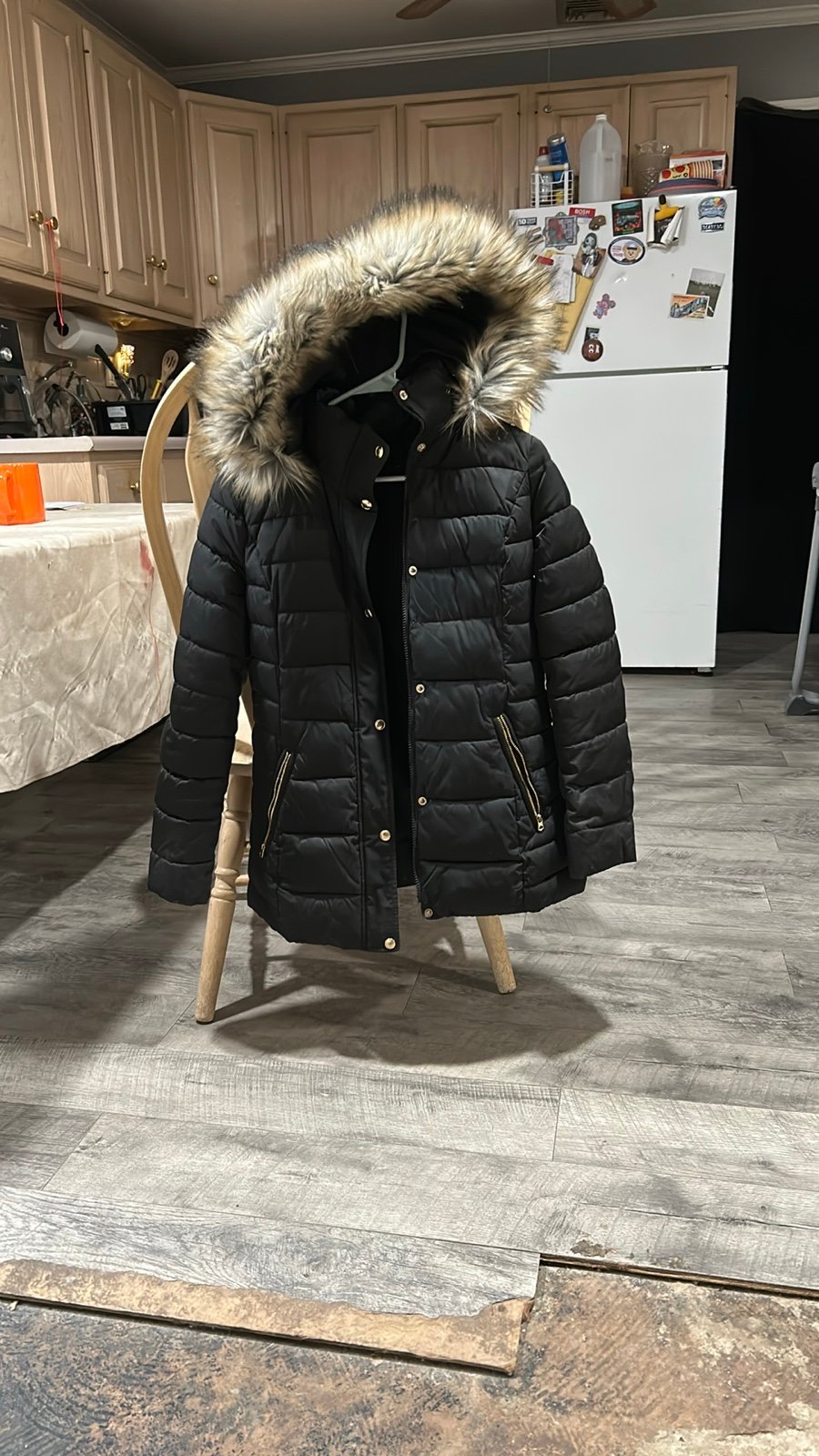 black puffer coat with faux fur hood