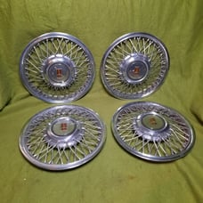 Set of (4) 87-1990 Oldsmobile 14 Spoke Wire Wheel Covers Hubcaps