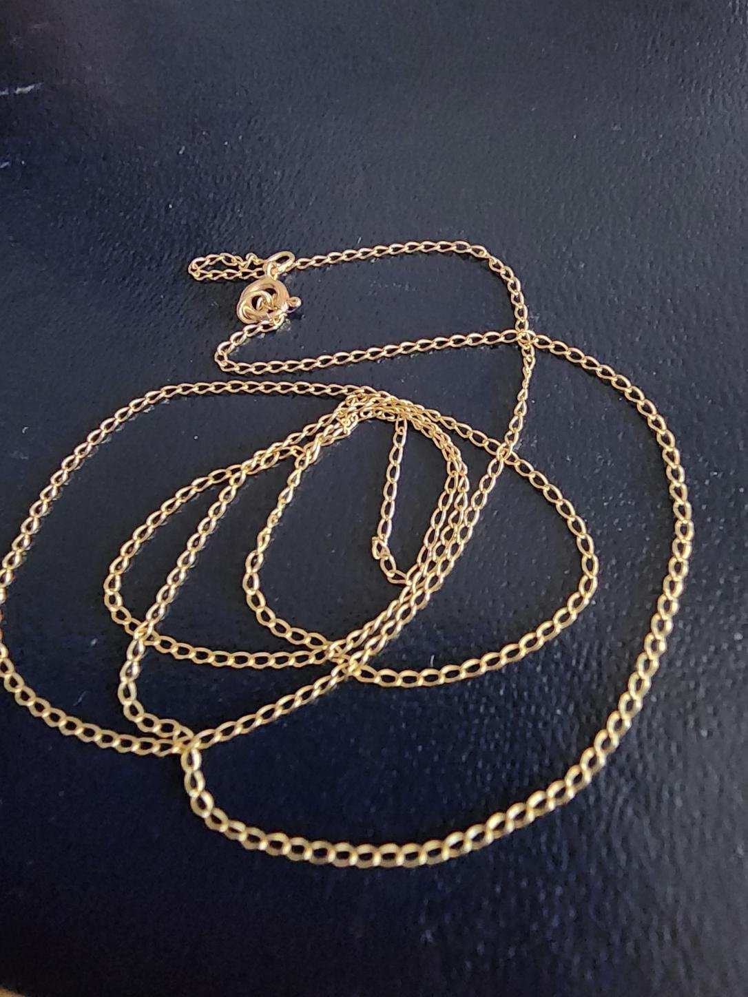 10k sold yellow gold chain 18”