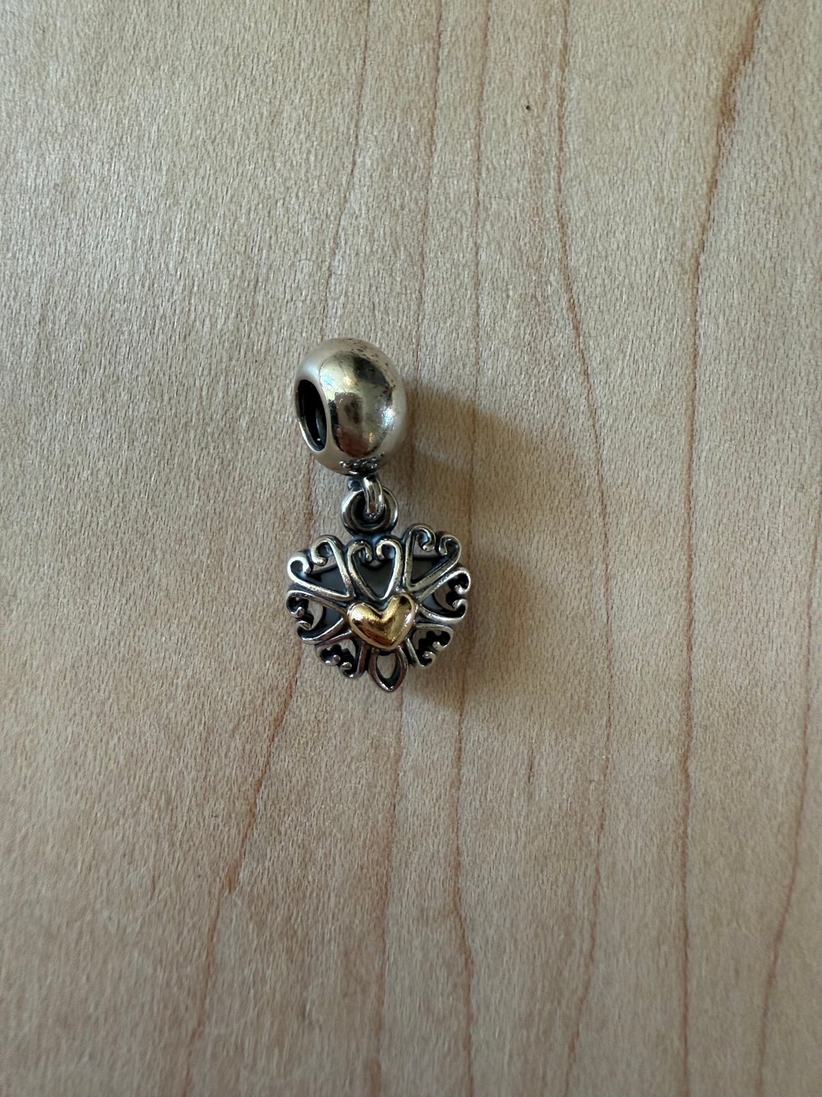 Pandora sterling and 14Kt gold filigree heart