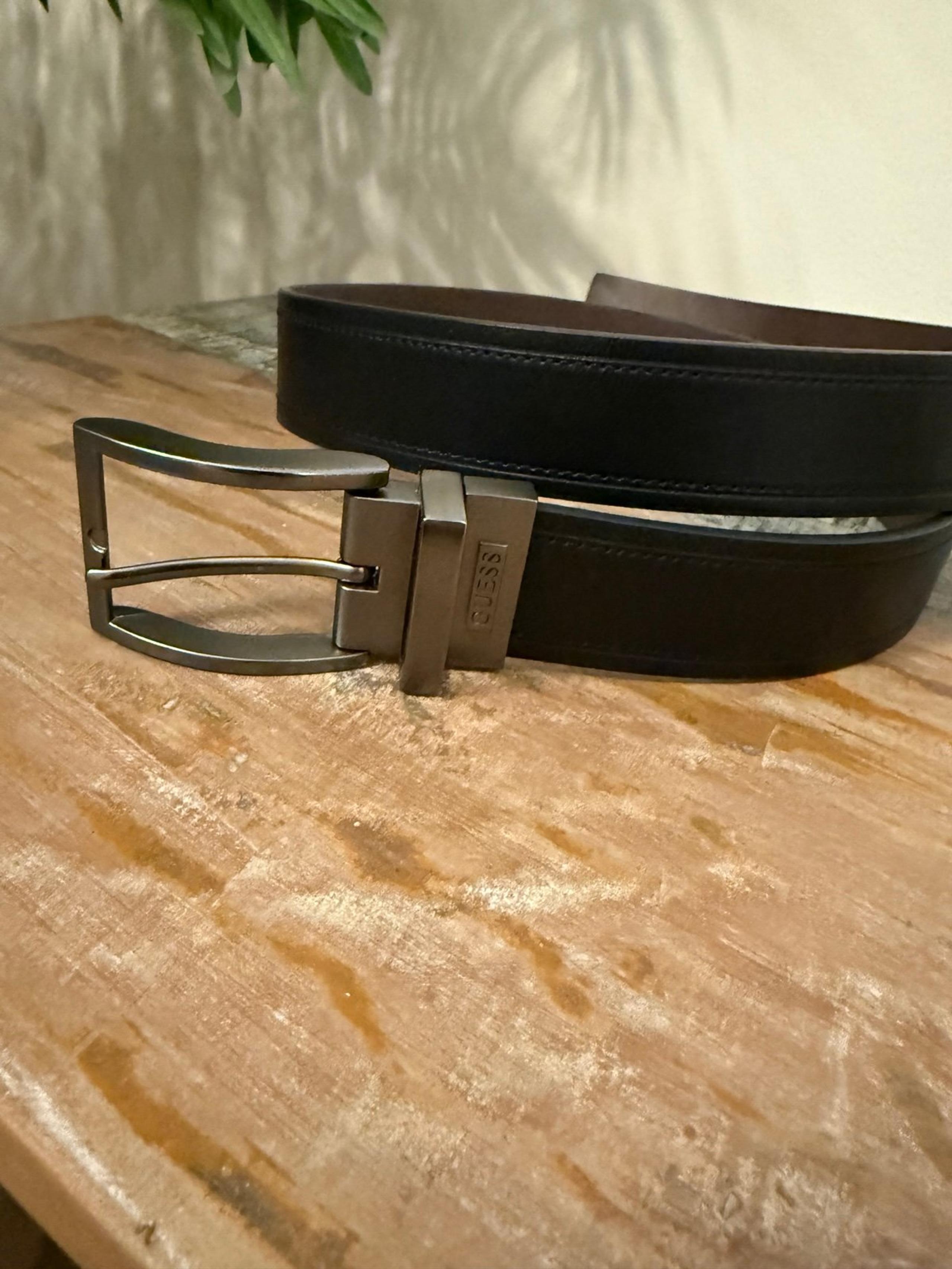 Guess Men’s black belt.  M 34-36. Synthetic Leather.
