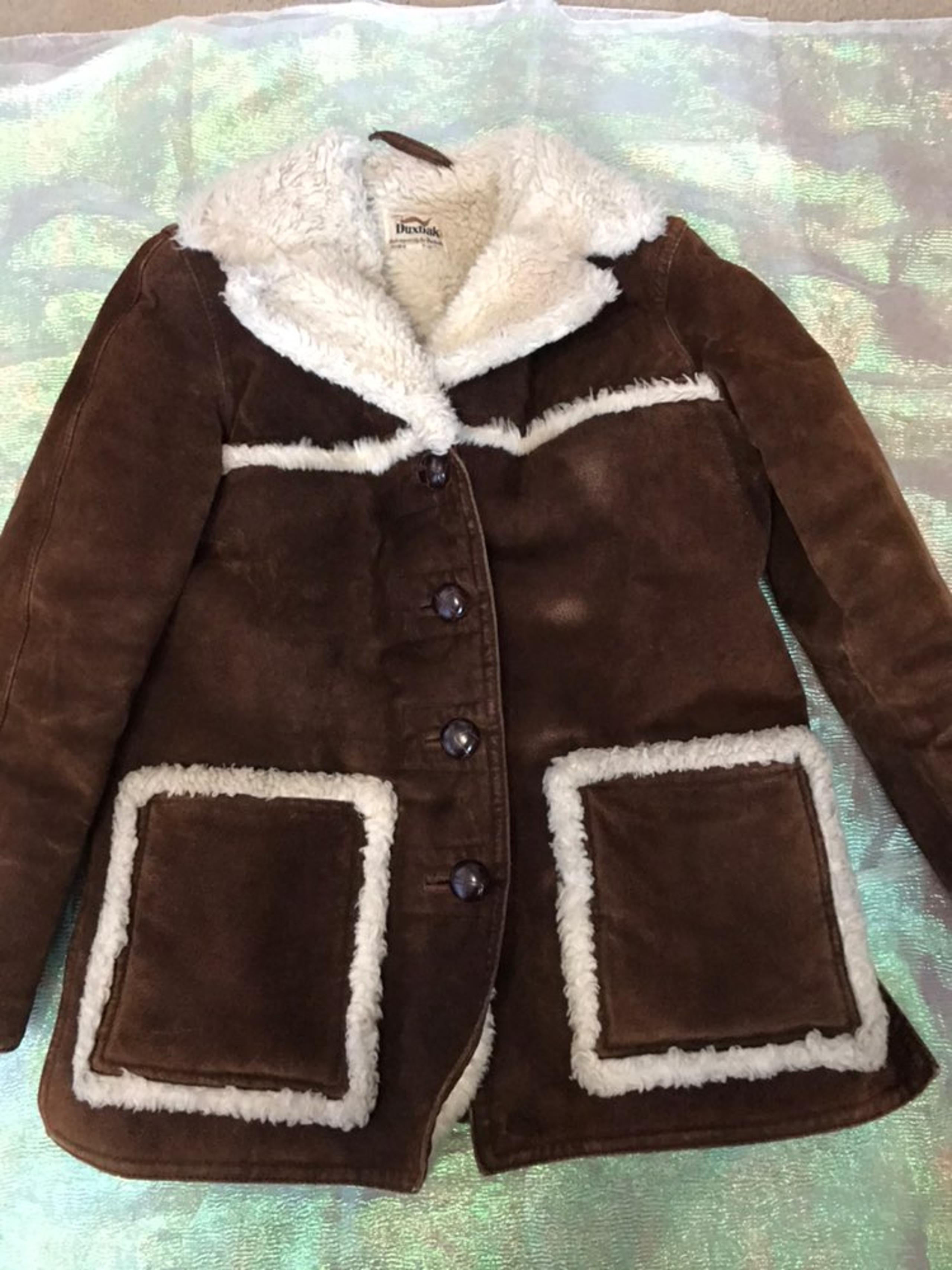 Leather coat with sheep lining