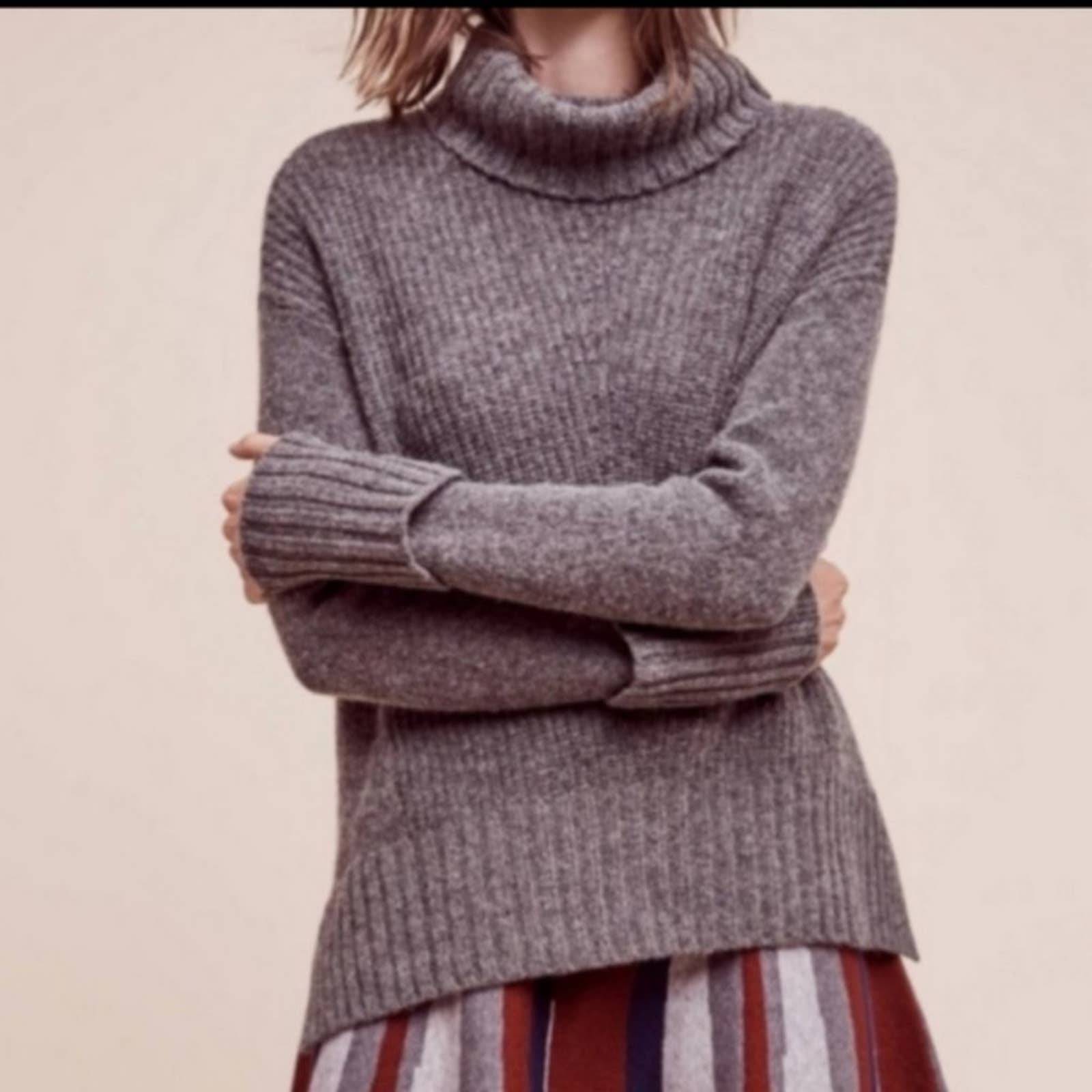 moth turtleneck sweater
