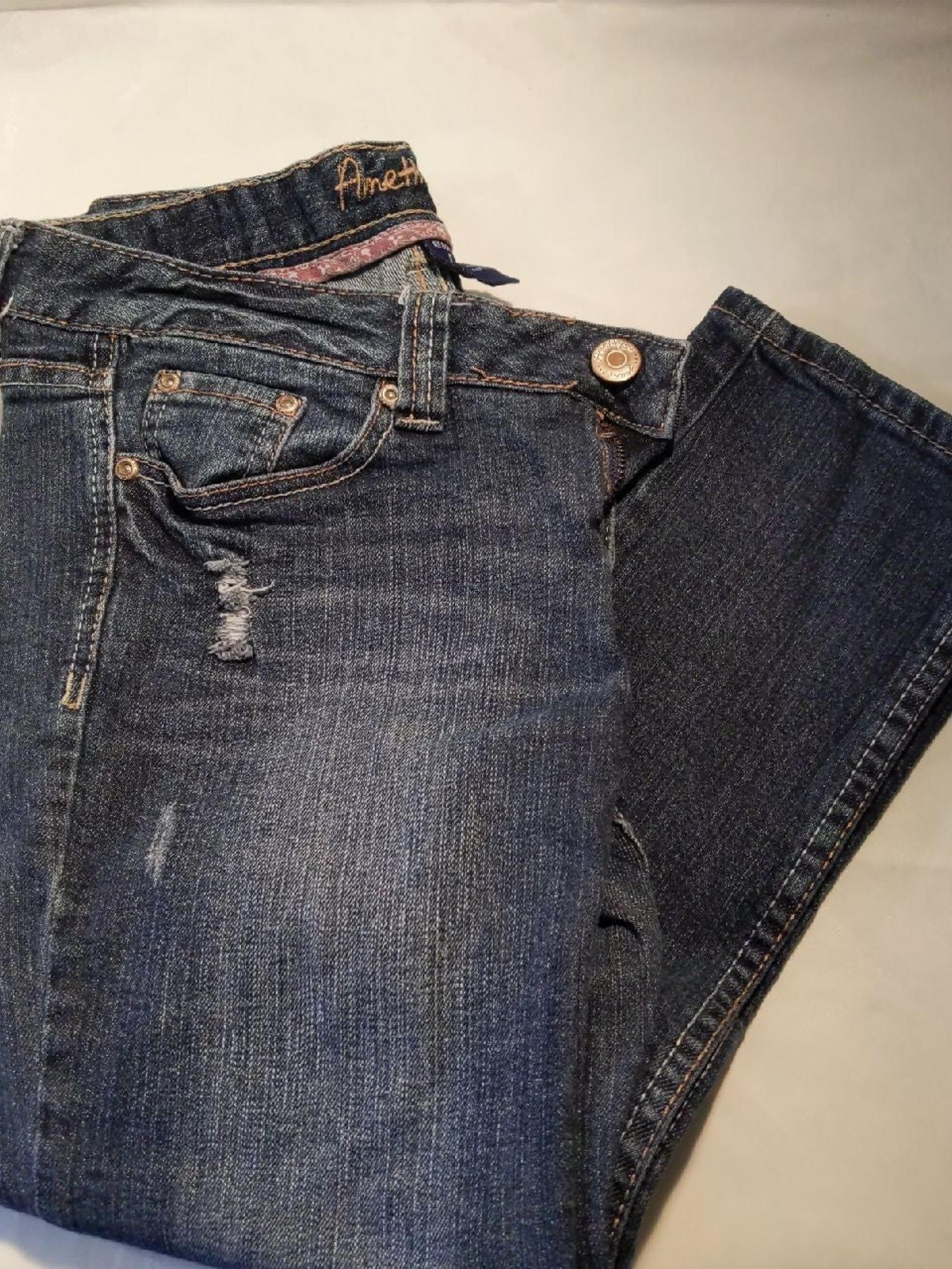 Amethyst distressed ripped skinny jeans
