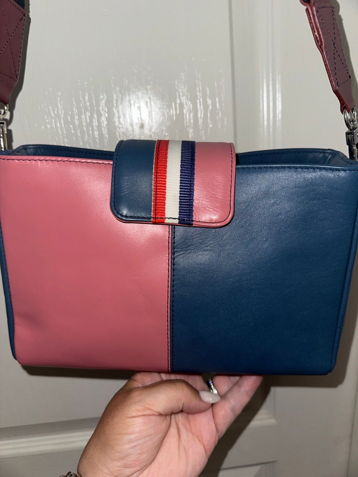 Soruka crossbody. Beautiful blue and pink. 3 pockets on inside with dust bag