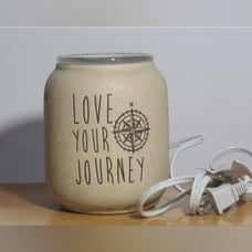 Scentsy Love your Journey wax warmer has a little wax on it