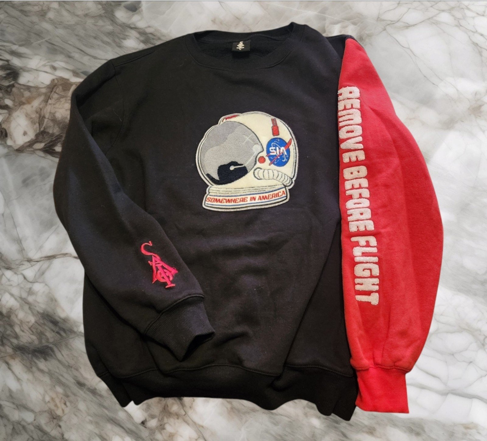 SIA Collective Somewhere in America NASA Spaceman Crewneck Sweatshirt