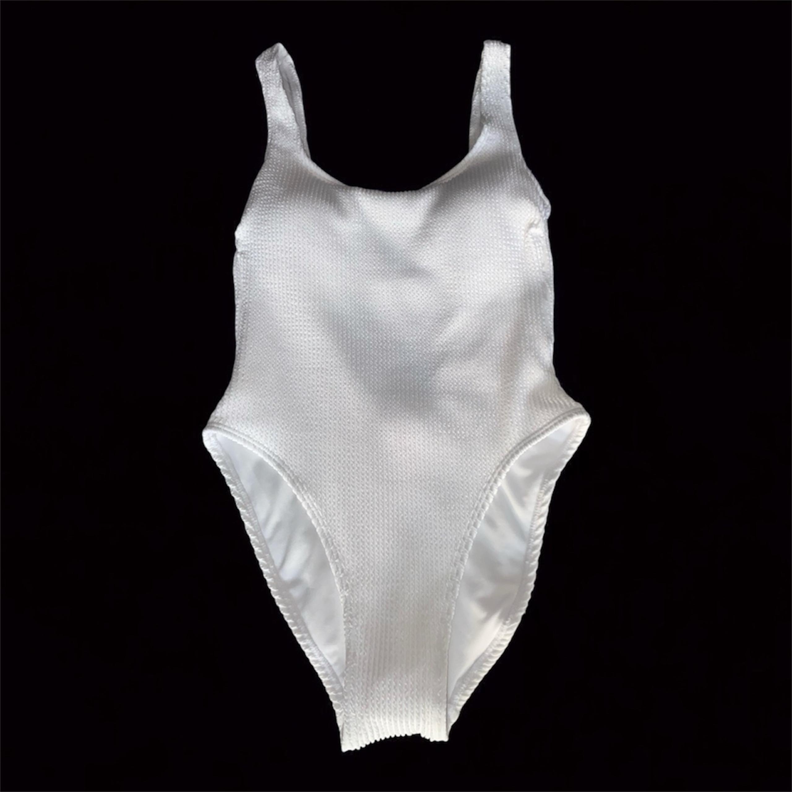 No Boundaries, One Piece Vivid White Popcorn bathing suit is a Women’s Size S.