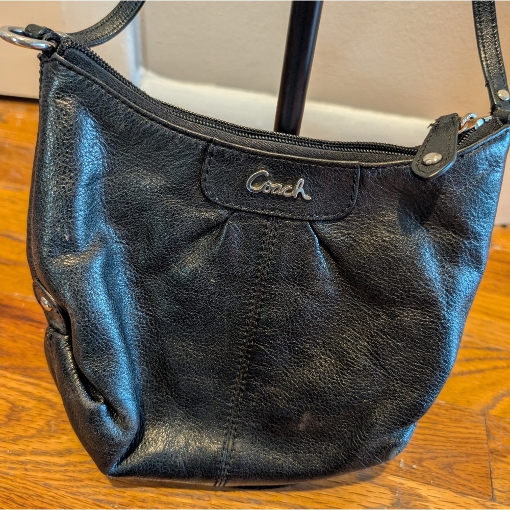 Coach Black Leather Shoulder Bag with Slouchy Design