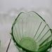 Green Uranium Depression Glass creamer and sugar. Pinwheel pattern