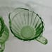 Green Uranium Depression Glass creamer and sugar. Pinwheel pattern