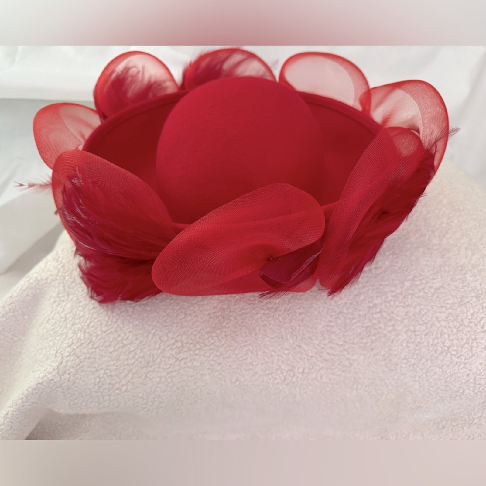 David M Vintage Women’s Red wood hat. Crown covered w/coque, feathers.