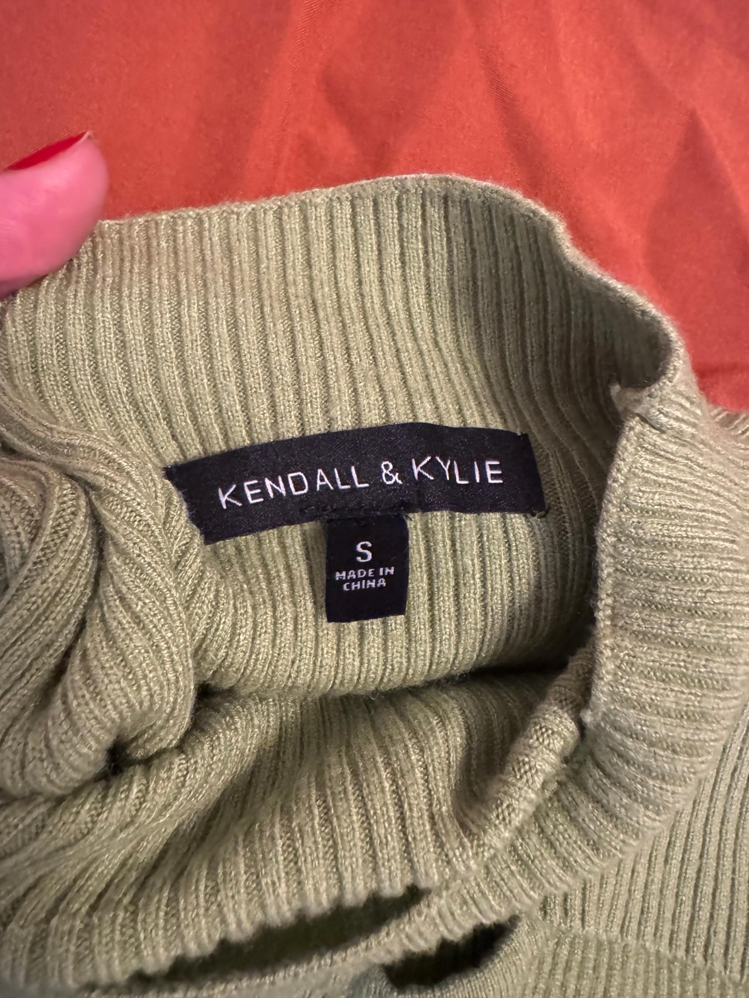 Sweater with chest slit