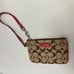 COACH Signature canvas, Corner Zip Wristlet, Pink Leather Trim, Strap & Patch,