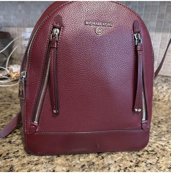 Michael kors leather Logo Burgandy small everyday/Travel backpack Retail 358