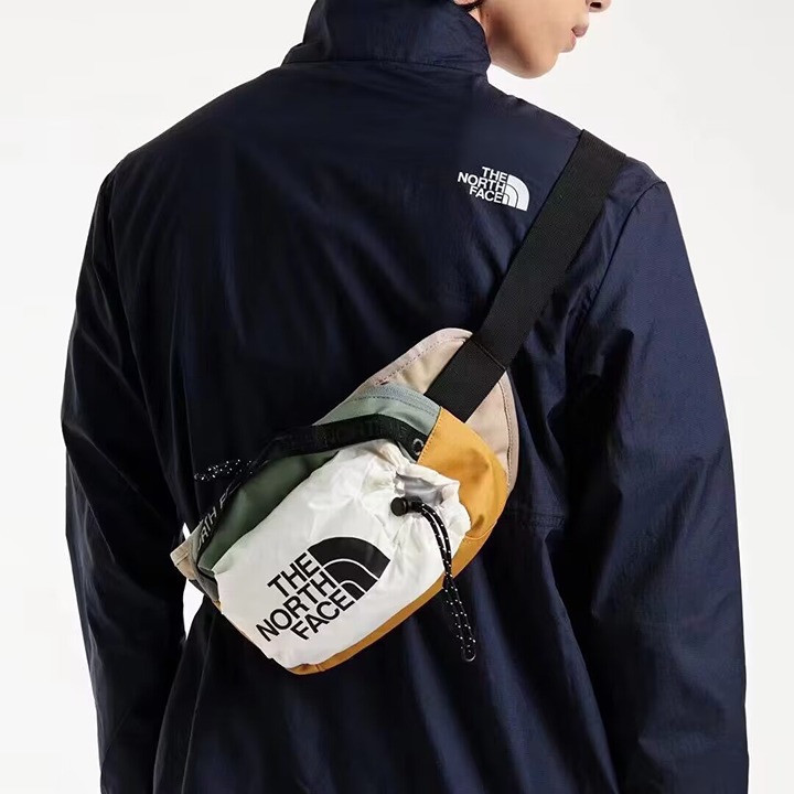 the color white and yellow for The North Face bag new