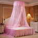 Elevate Your Bedroom with a Stylish Round Ceiling Mosquito Net and String Lights
