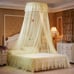Elevate Your Bedroom with a Stylish Round Ceiling Mosquito Net and String Lights