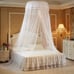 Elevate Your Bedroom with a Stylish Round Ceiling Mosquito Net and String Lights