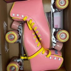 impala pink and yellow rollerskates