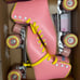 impala pink and yellow rollerskates