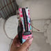 Lesportsac Tokidoki Citta Rosa Cell Phone Case Wristlet W/ Figurine