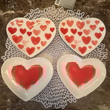 Set of four Maxcera Valentine’s heart-shaped appetizer plates.