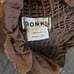 DONNI. | Linen Blend Smocked Ruffle Tube Top In Sand