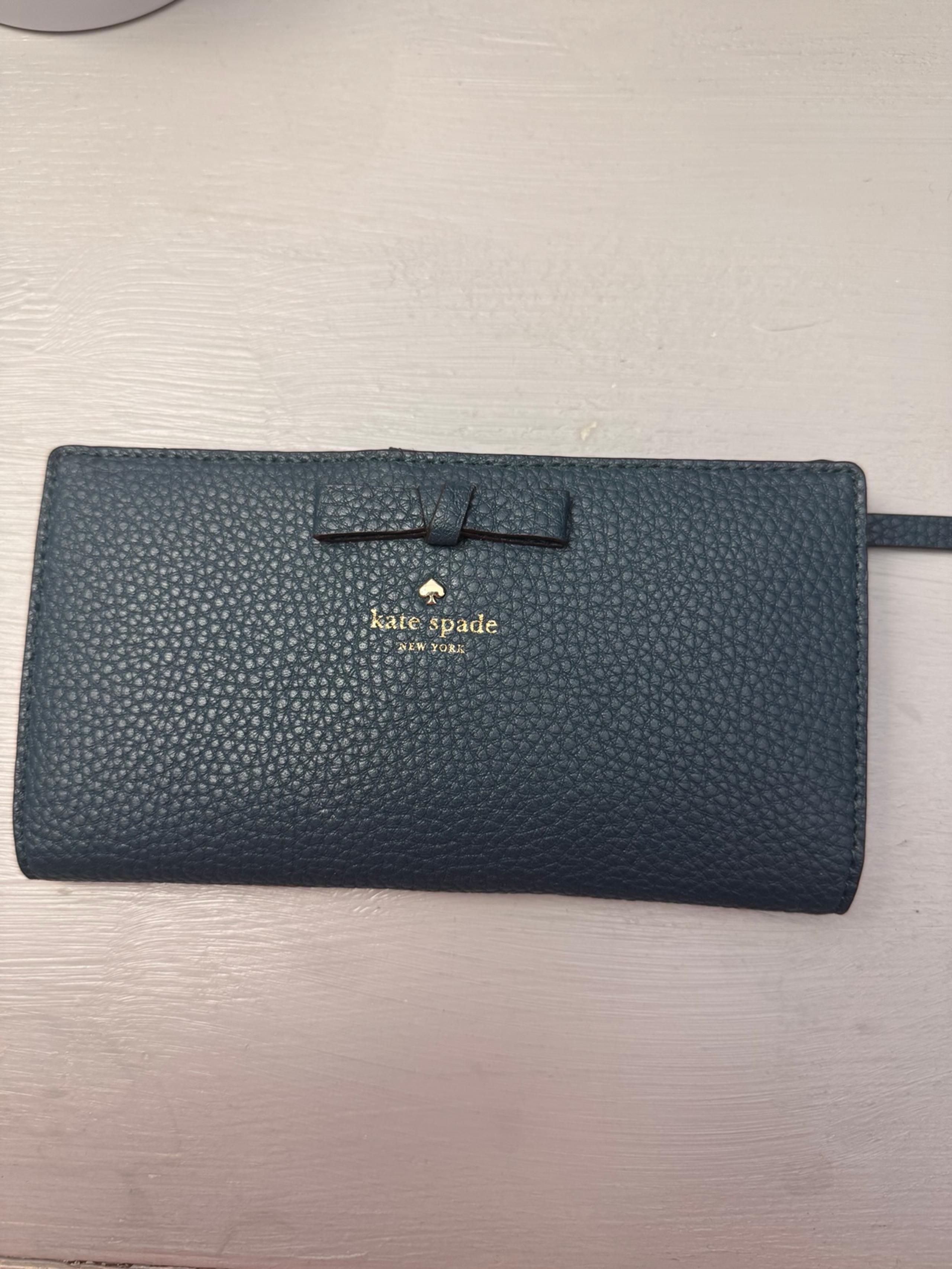 Kate Spade teal wallet with bow detail