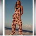 NWT RARE FREE PEOPLE Movement Printed Hot Shot Onesie in Desert Daze Sz M