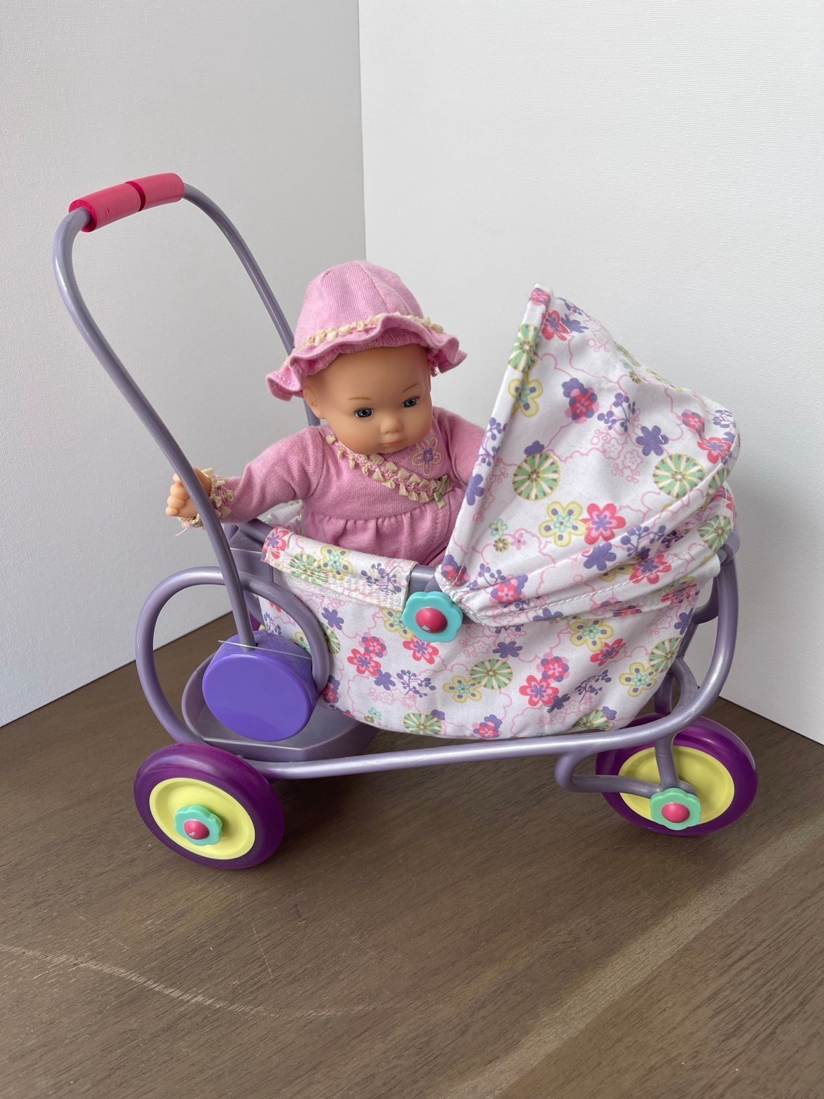 American girl Caring for Baby and Stroller