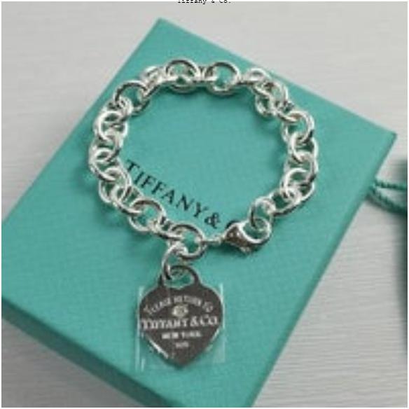 Sterling silver with a round brilliant diamond