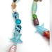 Strand of fancy glass beads. 1009