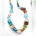 Strand of fancy glass beads. 1009