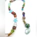 Strand of fancy glass beads. 1009