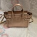 Coach gold colour handbags