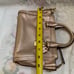 Coach gold colour handbags