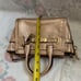 Coach gold colour handbags