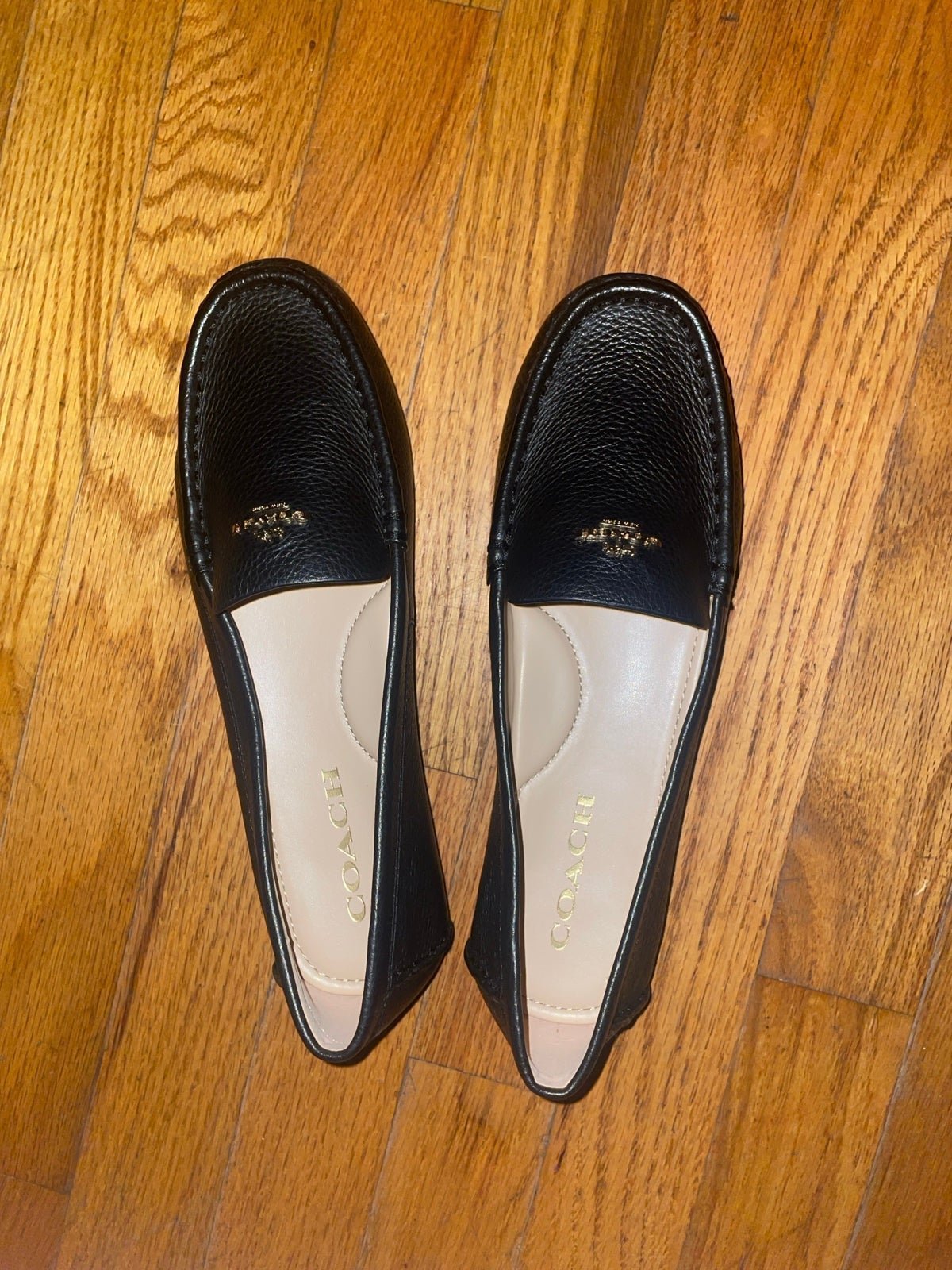 Brand new never worn black leather coach penny loafers size 7.5