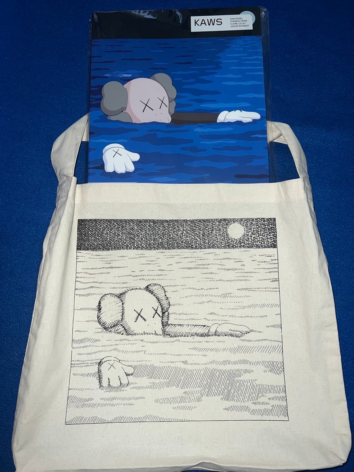 Kaws x Uniqlo Art Book Bundle…….