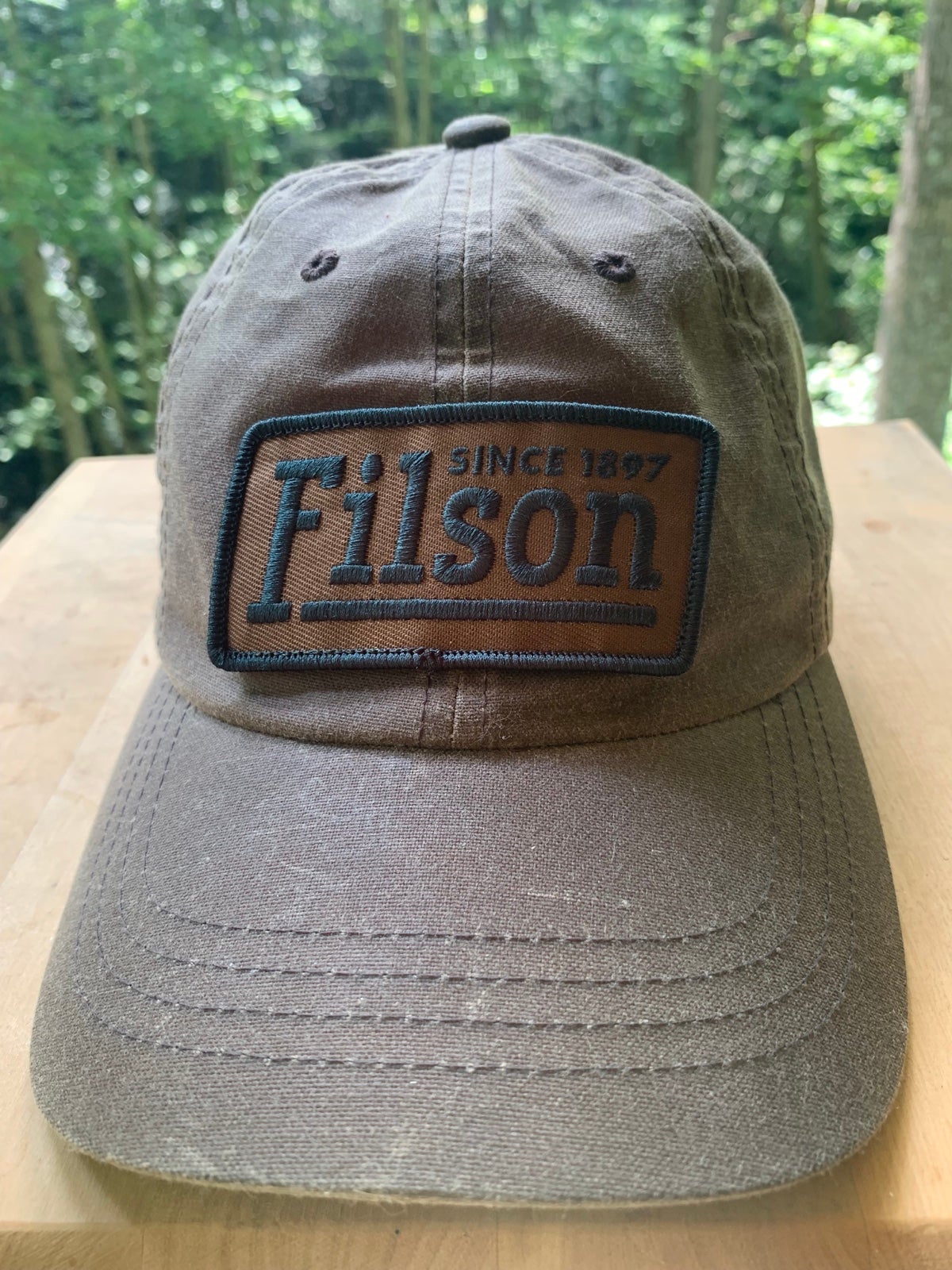 Filson Brown Waxed Canvas Hat with green patch