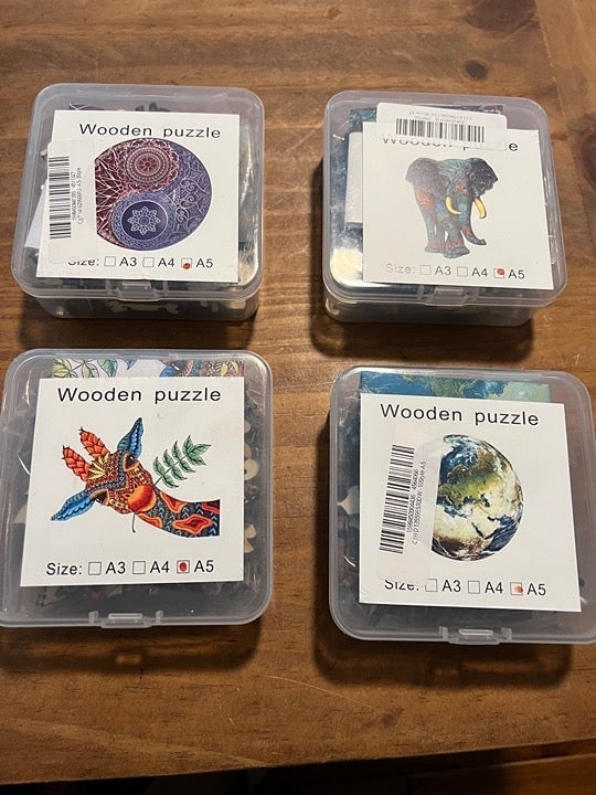 Set of 4 wooden puzzles