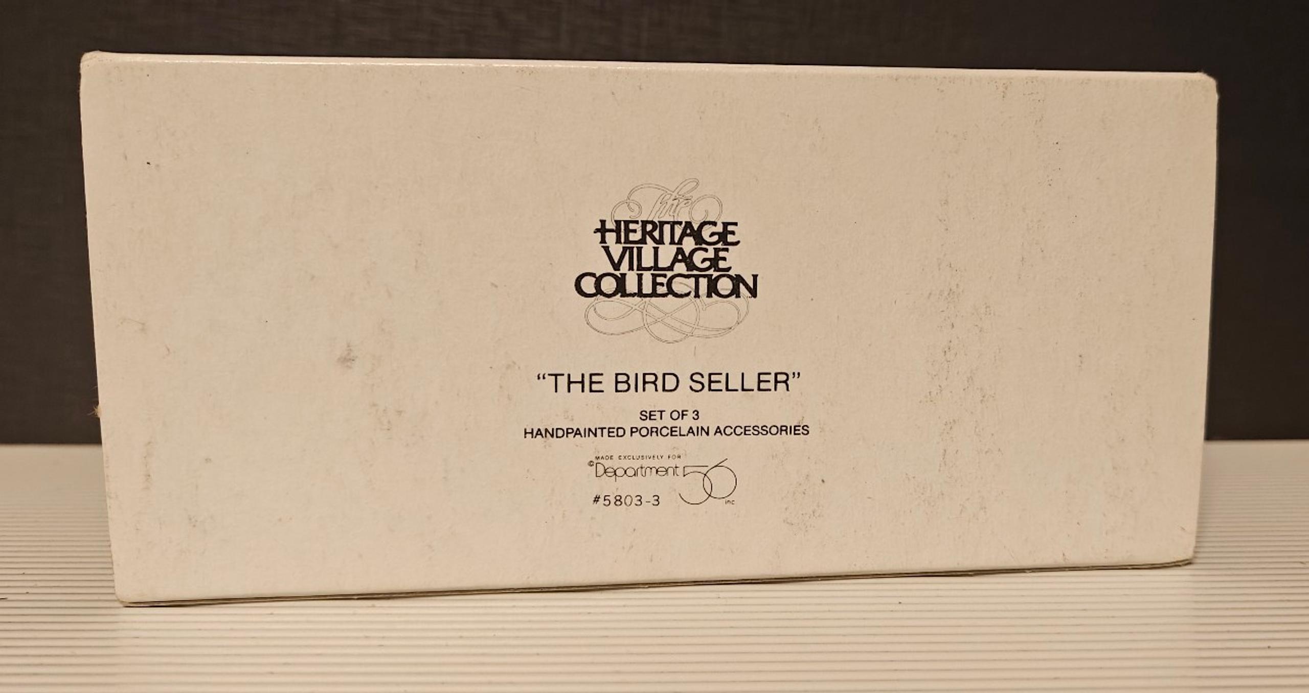 The Bird Seller" set from the Department 56 Heritage Village Collection.
