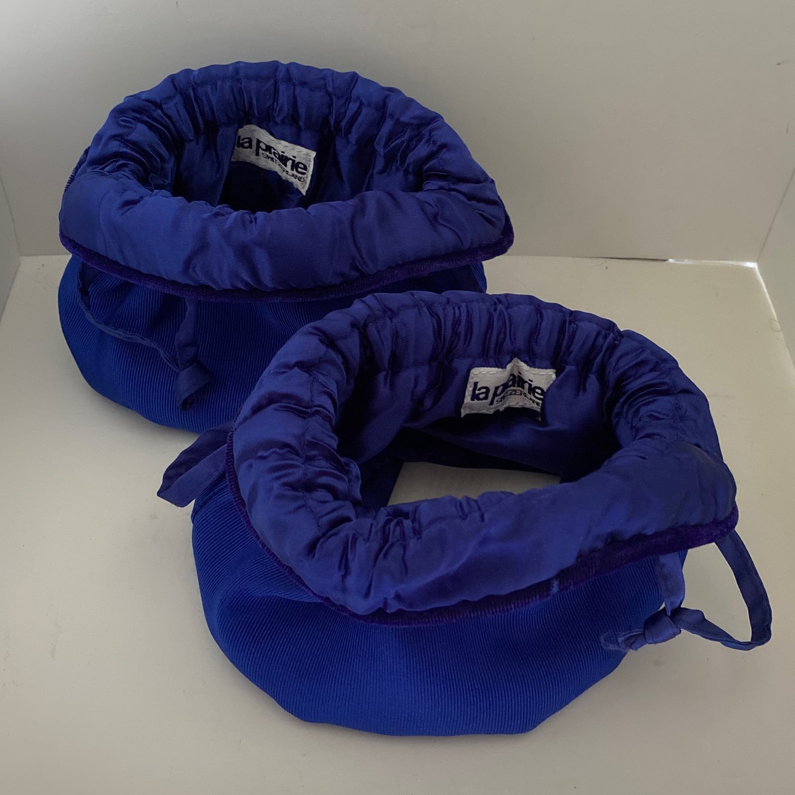 La prairie cosmetics and jewelry bags