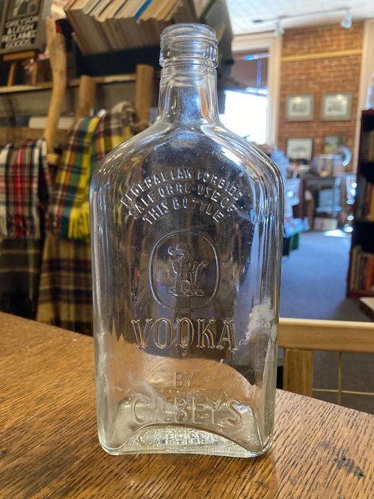 vintage Vodka by Gilbey’s pint bottle dragon castle logo embossed collectible