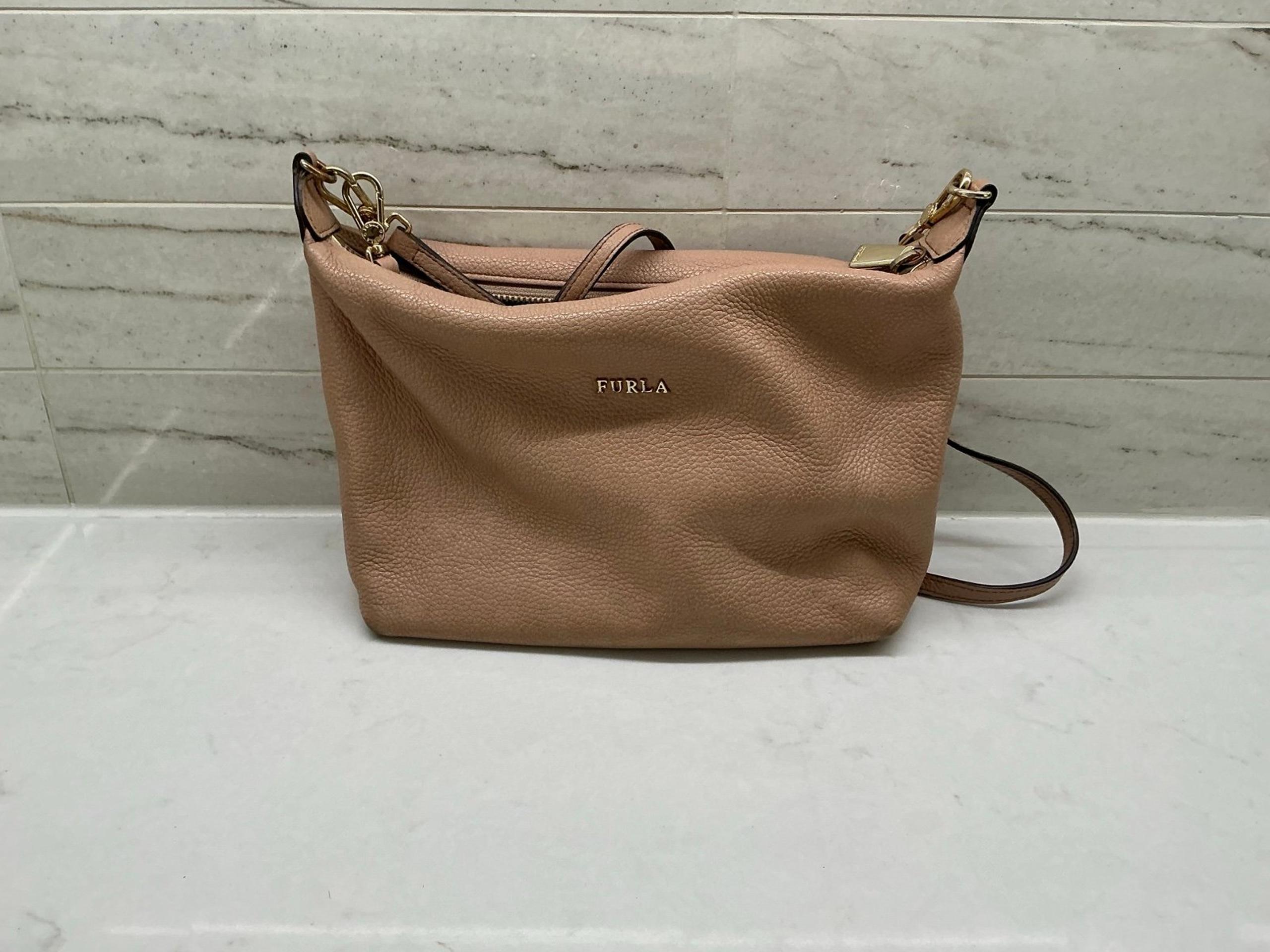 Furls pink/beige over the shoulder bag purse