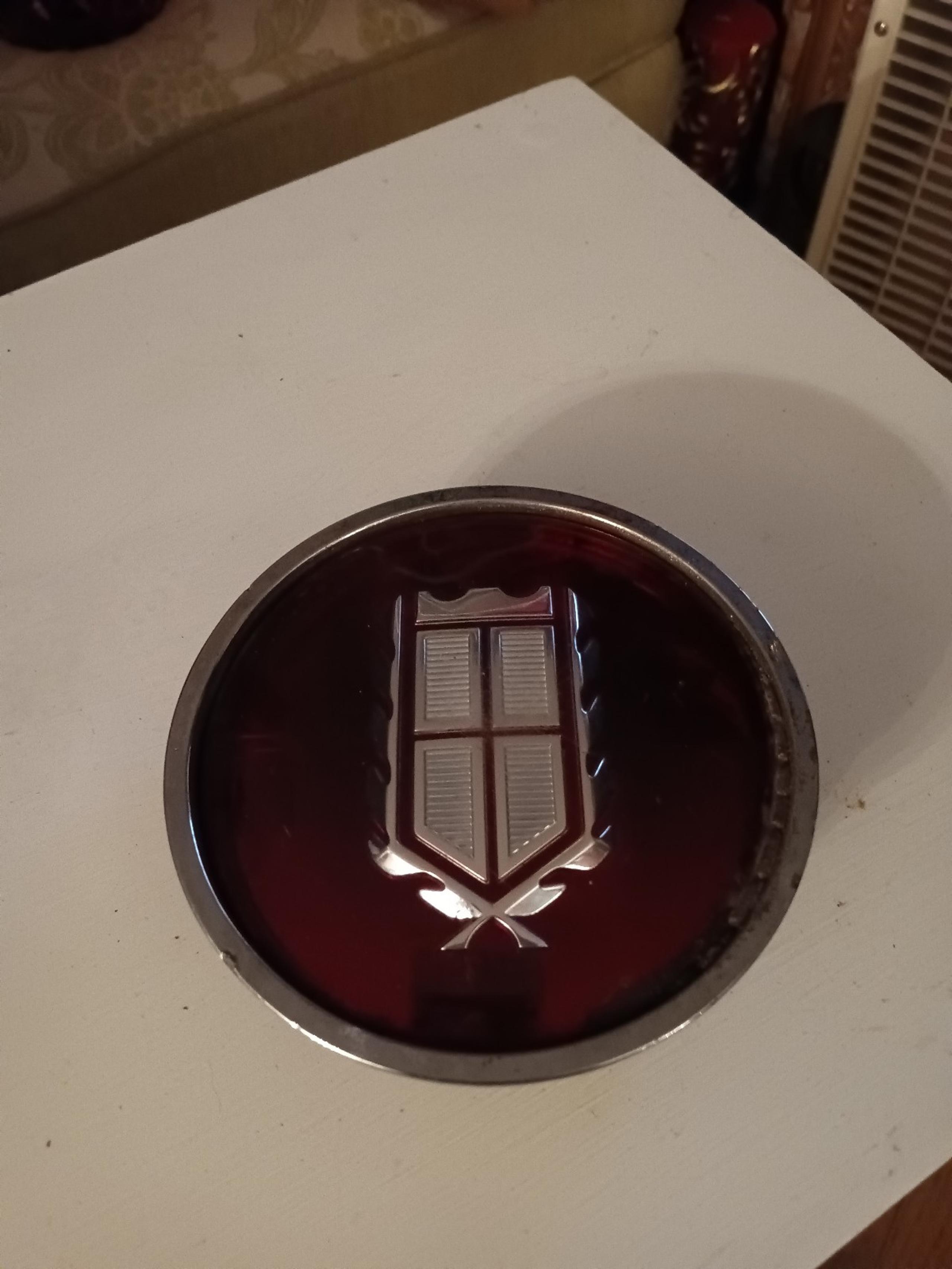 Mercury marquis wire hubcap emblem