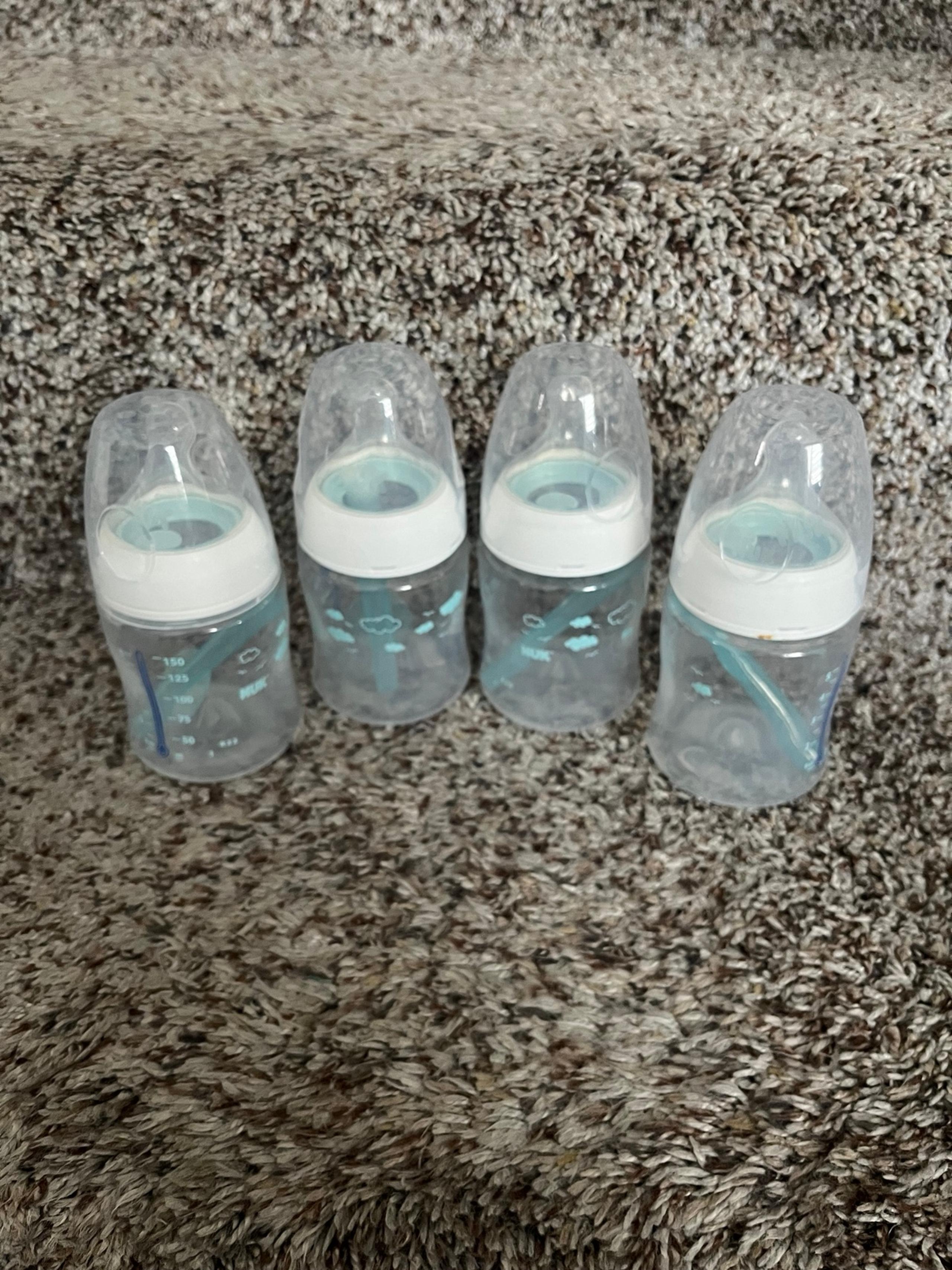 Set of 4 nuk baby bottles