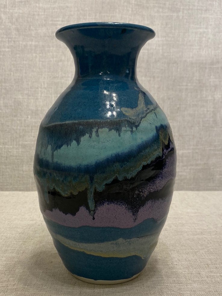 Signed studio pottery drip glaze vase.